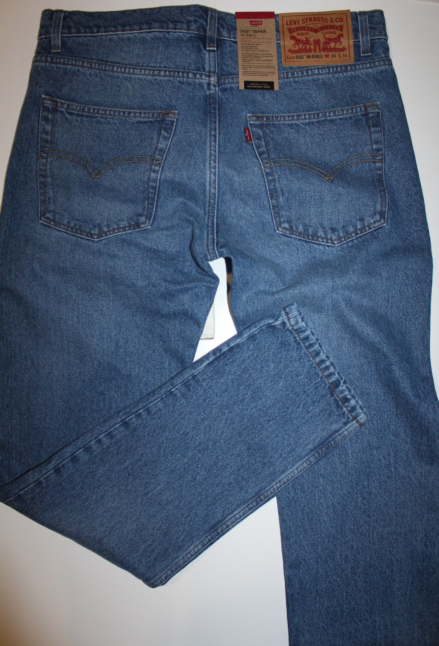 Calça 18 Levis 502 Hi Ball