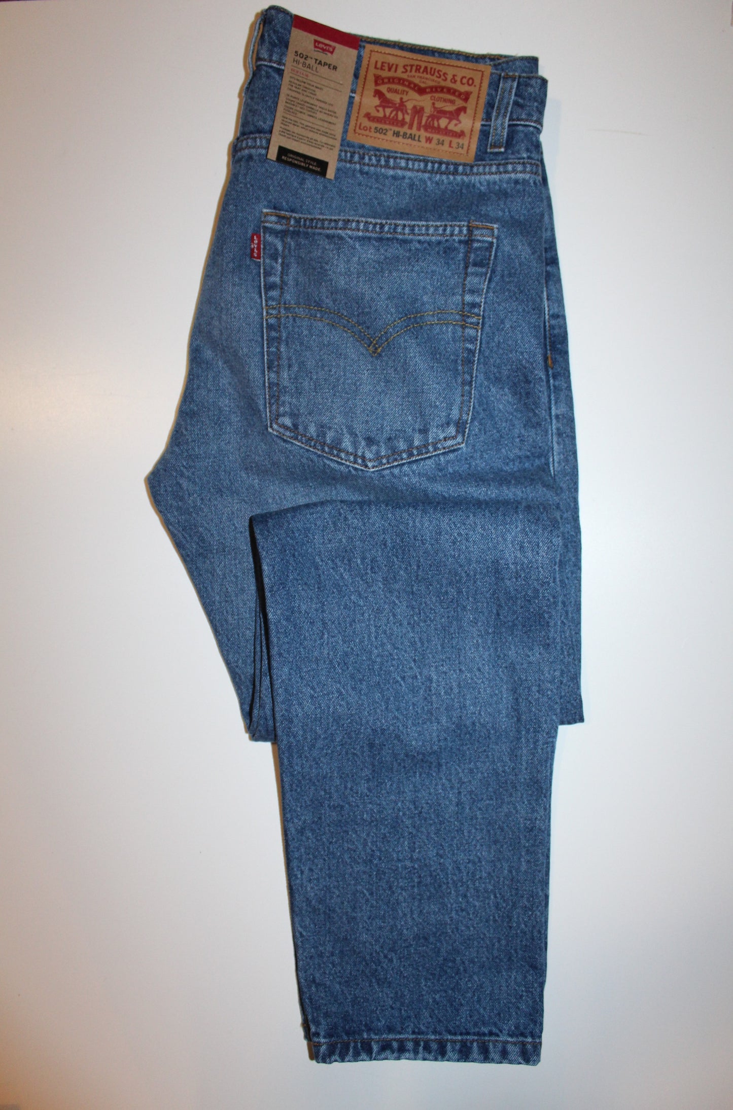 Calça 18 Levis 502 Hi Ball